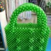 Green bead decorated bag
