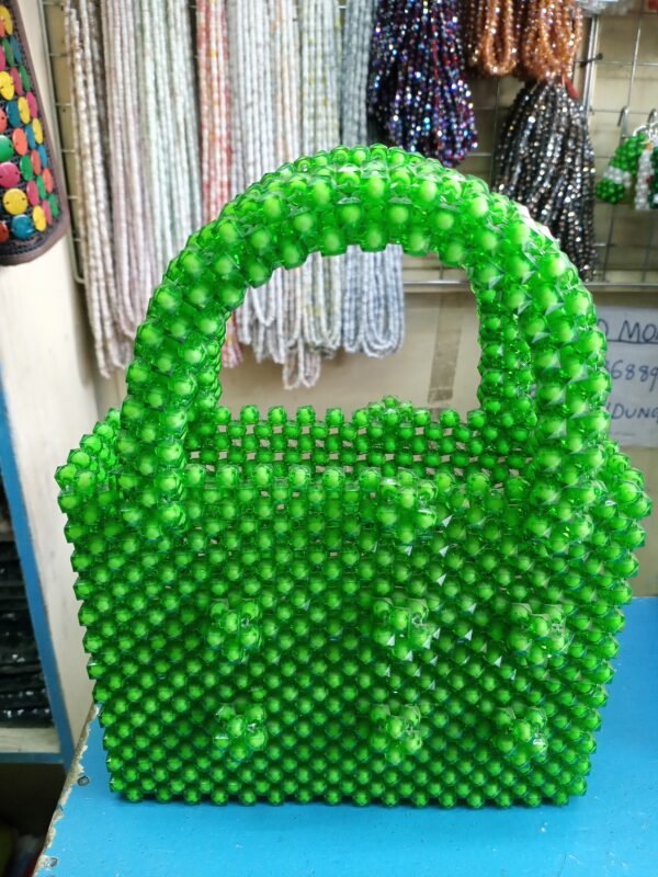 Green bead decorated bag